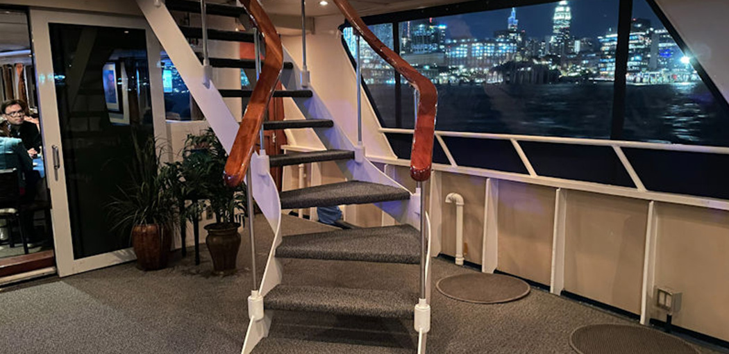 Exterior Affinity Yacht Night Time Showing Stairs to The Upper Deck