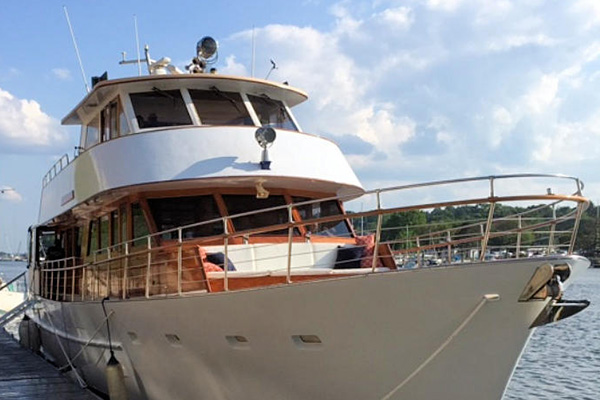on a nice sunny day, the Bow of the Calypso coming out of the picture dockside