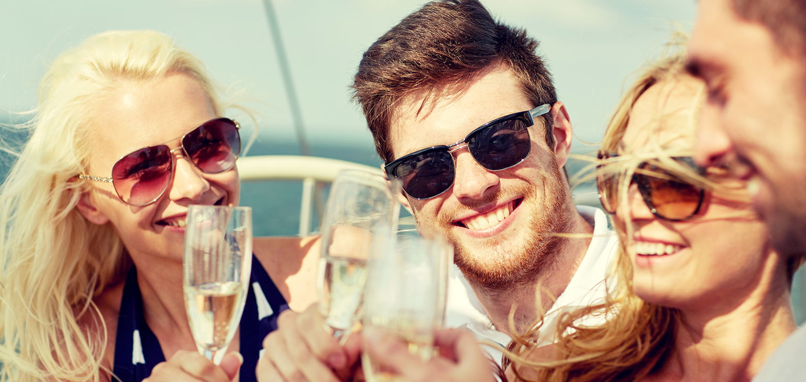 Three Peopl;e Close-up enjoying a sunny day on a yacht