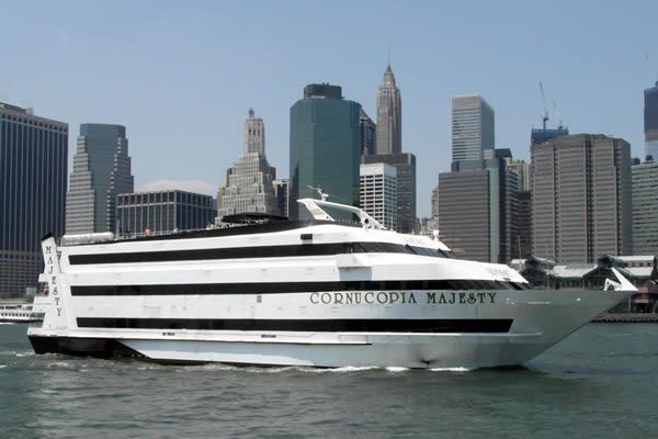 Cornucupia Majesty Mega Luxury Yacht with the NYC Skyline in the background 